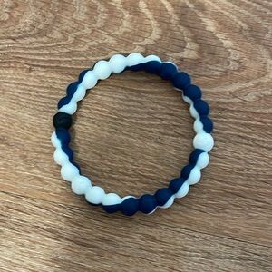 Dark blue and white swirl Lokai bracelet​​​​​​​